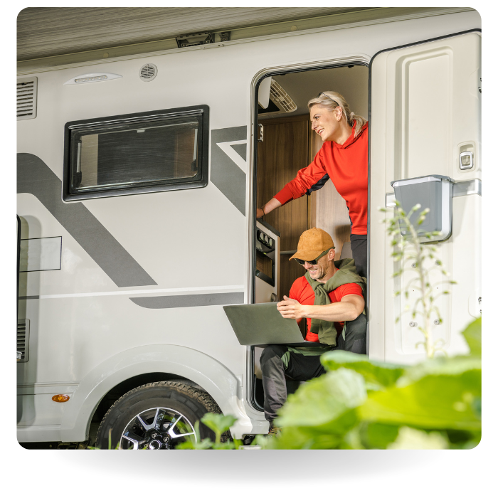 man and woman in an RV