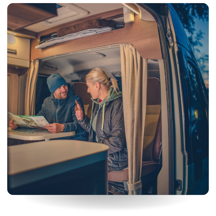 couple camping in an RV